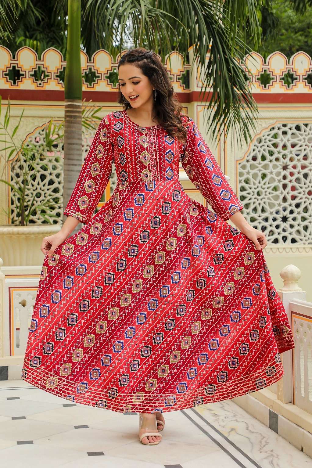 MS-1125 HIT DESIGN BY AQSAWHOLESALE RAYON BANDHEJ PRINT WORK GOWN