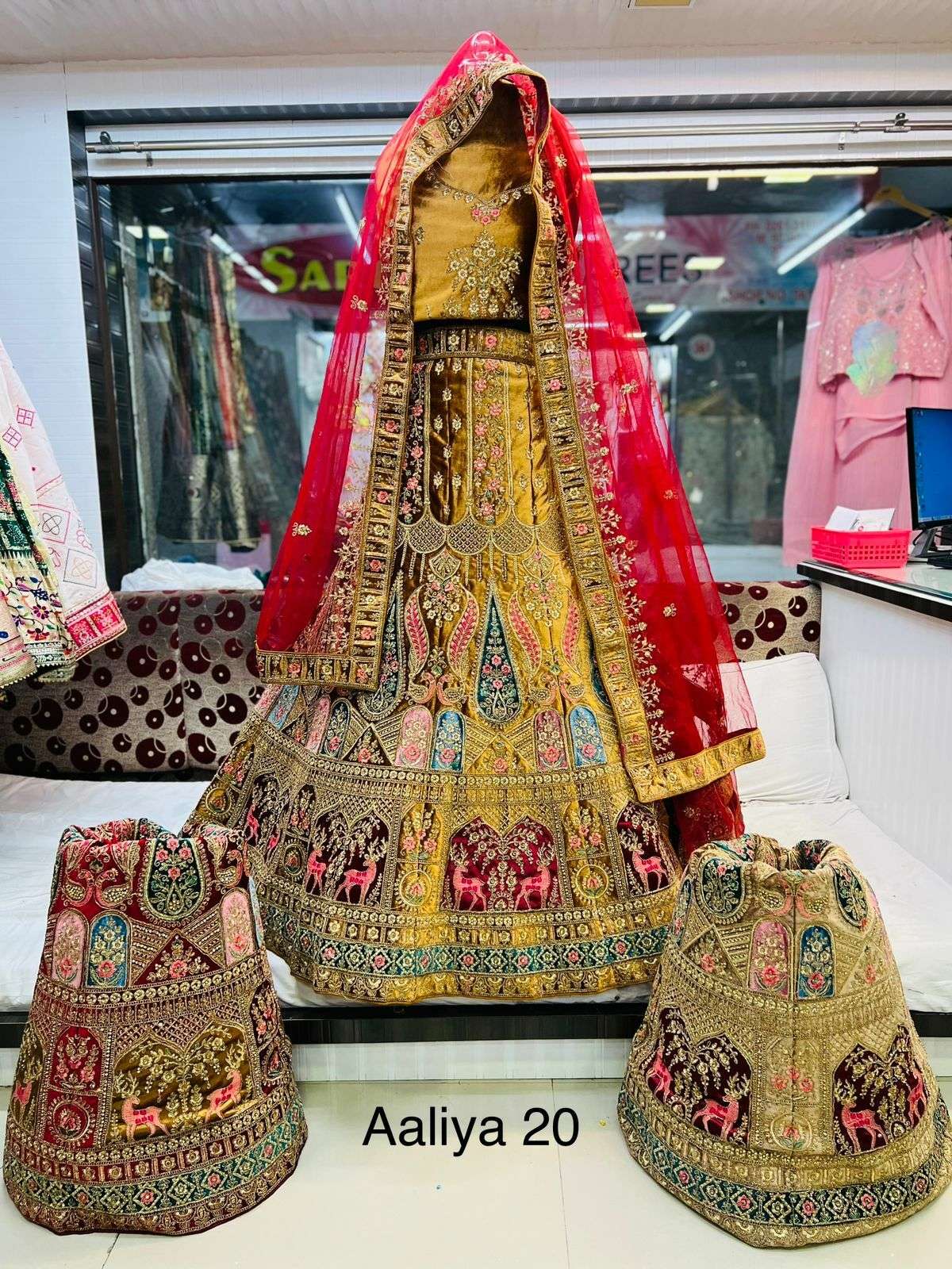 AALIYA 20 HIT DESIGN BY AQSAWHOLESALE DESIGNER FABRIC HEAVY WORK BRIDAL LEHENGA