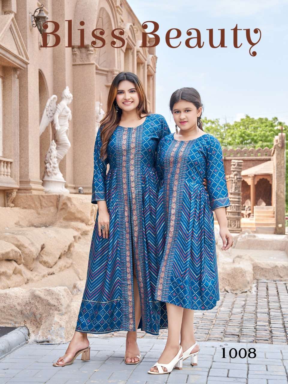 ME AND MOM VOL-5 BY AQSAWHOLESALE 1001 TO 1010 SERIES RAYON FOIL PRINT KURTI & KIDS GOWNS