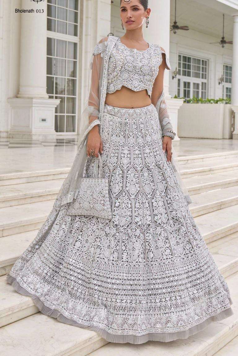 BHOLENATH 013 HIT DESIGN BY AQSAWHOLESALE DESIGNER FABRIC HEAVY WORK CROP-TOP LEHENGA