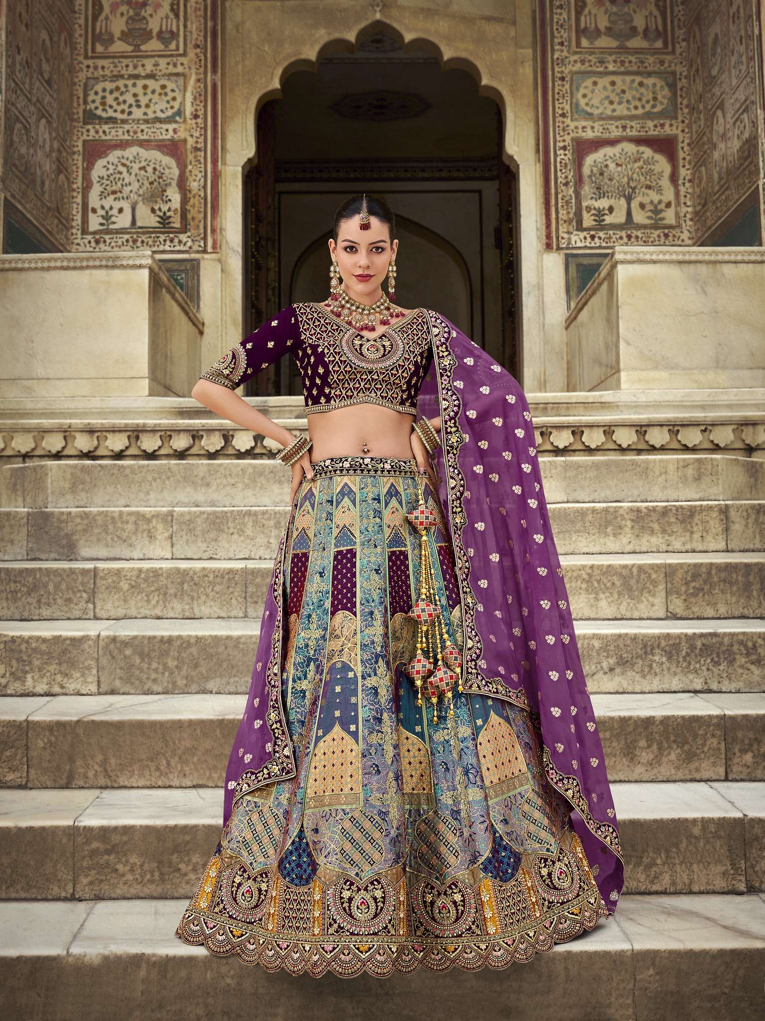 SURSHYAM FASHION KALAMKARI BY AQSAWHOLESALE BANRASI SILK HEAVY WORK BRIDAL LEHENGAS